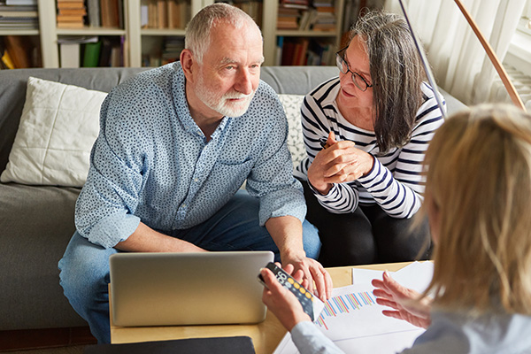 A couple consulting with an advisor